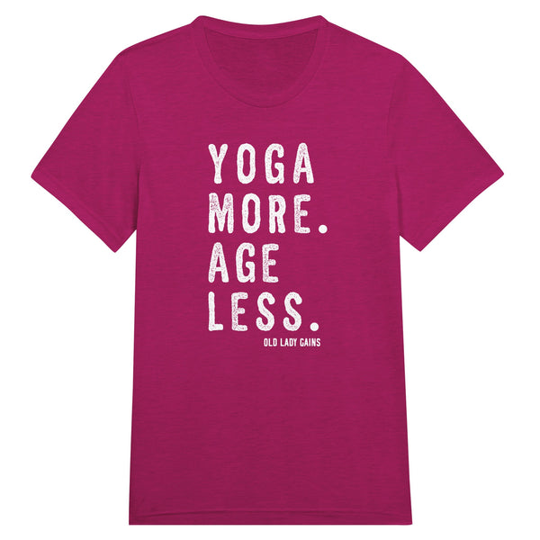 Empowering fitness pink t-shirt for women over 40 featuring the slogan “Yoga More. Age Less.”