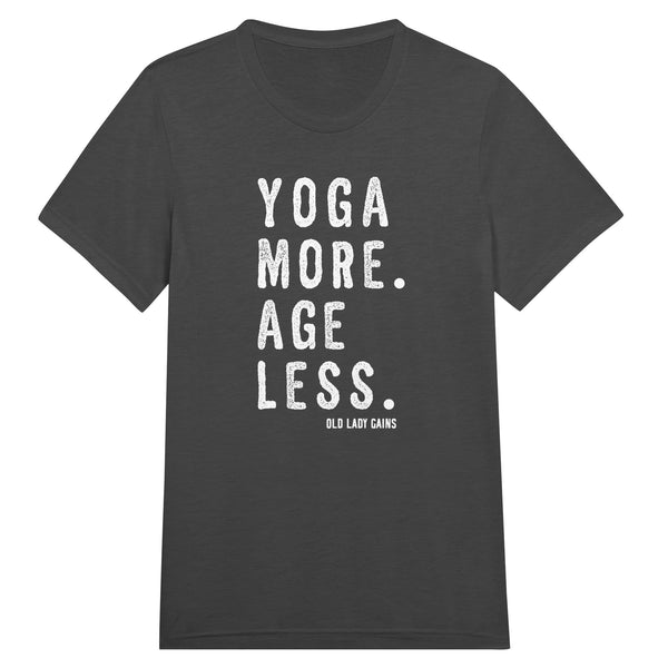 Empowering fitness black tri-blend t-shirt for women over 40 featuring the slogan “Yoga More. Age Less.”
