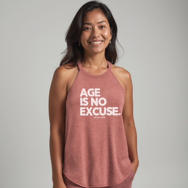 Confident woman over 40 wearing No Excuses halter tank during workout