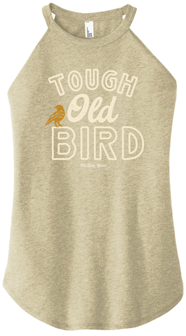 Beige tank top with 'Tough Old Bird' text and bird graphic on a white background
