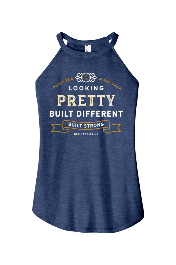 Woman's navy halter tank top reading "Built for More Than Looking Pretty. Built Different. Built Strong." by Old Lady Gains, motivational fitness apparel for women over 40.