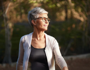 Old Lady Gains Motion is Lotion Blog Midlife Grey Hair Woman Wearing Glasses Walking Outside 