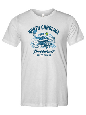 White t-shirt with 'North Carolina Pickleball Takes Flight' design on a white background