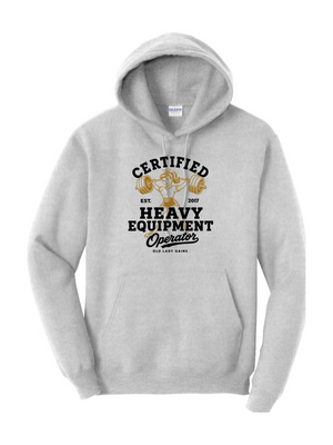 A light gray pullover hoodie with a graphic print on the front that reads 'CERTIFIED HEAVY EQUIPMENT OPERATOR' in black and gold, featuring a graphic of two hands holding a piece of equipment. The hoodie is displayed on a clean white background.