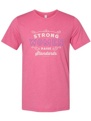 Pink t-shirt with motivational text that say strong women raise standards from Old Lady Gains on white background