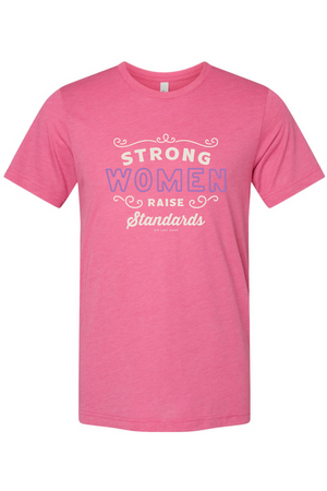 Pink t-shirt with motivational text that say strong women raise standards from Old Lady Gains on white background