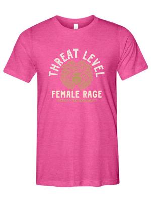 Pink t-shirt with 'THREAT LEVEL FEMALE RAGE' text and graphic on a white background