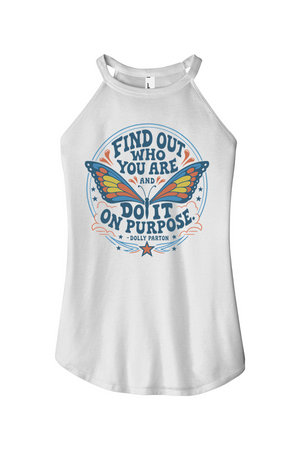 A white sleeveless tank top with a halter-style neck, featuring a colorful graphic print on the front with a butterfly and the text 'FIND OUT WHO YOU ARE AND DO IT ON PURPOSE' by Dolly Parton.