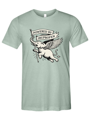 Light green t-shirt with a graphic of an elephant holding a banner that says 'Powered by Ibuprofen' on a white background.