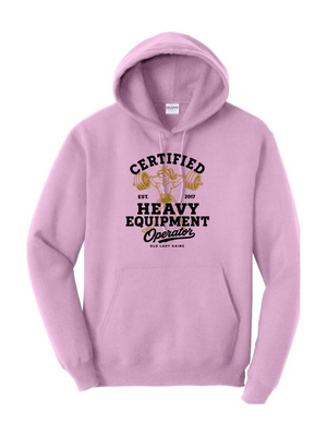 A light pink pullover hoodie with a graphic print on the front reading 'CERTIFIED HEAVY EQUIPMENT OPERATOR' in black and gold, displayed on a clean white background.