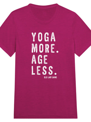 Empowering fitness pink t-shirt for women over 40 featuring the slogan “Yoga More. Age Less.”