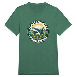 Vintage California pickleball t-shirt graphic featuring a great white shark swimming through floating pickleballs with bold retro typography.