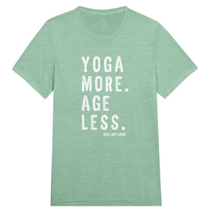 Empowering fitness mint t-shirt for women over 40 featuring the slogan “Yoga More. Age Less.”