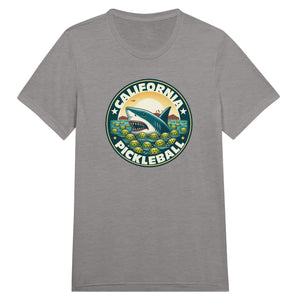Vintage California pickleball t-shirt graphic featuring a great white shark swimming through floating pickleballs with bold retro typography.