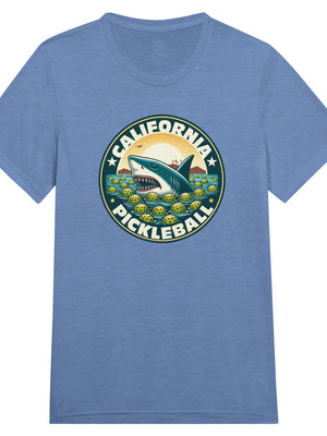 Vintage California pickleball t-shirt graphic featuring a great white shark swimming through floating pickleballs with bold retro typography.