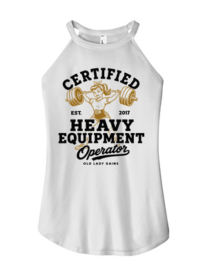 A white sleeveless tank top with a graphic print on the front that reads 'CERTIFIED HEAVY EQUIPMENT Operator' in black and gold, featuring an illustration of a woman lifting a barbell.