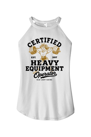 A white sleeveless tank top with a graphic print on the front that reads 'CERTIFIED HEAVY EQUIPMENT Operator' in black and gold, featuring an illustration of a woman lifting a barbell.