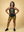 Woman wearing a black Old Lady Gains Powerful & Vaguely Threatening tank top with text and CVG sunflower shorts on a Gold background