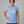 Confident woman over 50 wearing the Built for More Than Looking Pretty built different blue tshirt