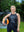 Woman wearing 'Lift More Age Less' tank – fitness top for strong women