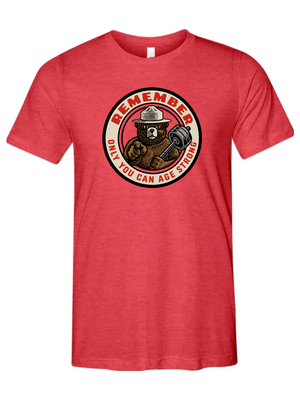 Red t-shirt with a bear graphic and text on a white background