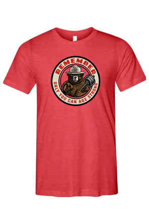 Red t-shirt with a bear graphic and text on a white background