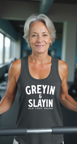 Confident women wearing greyin and slayin racerback tank empowered senior female