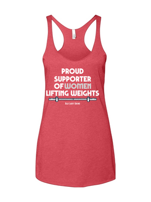 A red racerback tank top featuring the white text "PROUD SUPPORTER OF WOMEN LIFTING WEIGHTS" above a detailed barbell graphic with the "Old Lady Gains" brand name underneath.