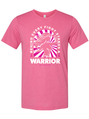 A pink short-sleeve crewneck t-shirt with a graphic on the front featuring a stylized fighter's silhouette in pink and white, with the text 'BEHIND EVERY FIGHT STANDS A WARRIOR' and 'OLD LADY GOATS'.