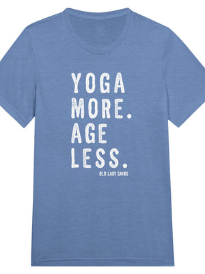 Empowering fitness blue t-shirt for women over 40 featuring the slogan “Yoga More. Age Less.”