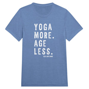 Empowering fitness blue t-shirt for women over 40 featuring the slogan “Yoga More. Age Less.”