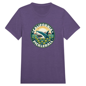 Vintage California pickleball t-shirt graphic featuring a great white shark swimming through floating pickleballs with bold retro typography.