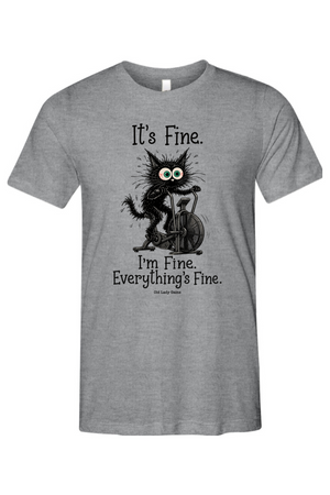 A heather gray short-sleeve crewneck t-shirt featuring a black graphic of a cartoon cat riding a bicycle with the text 'It's Fine. I'm Fine. Everything's Fine.