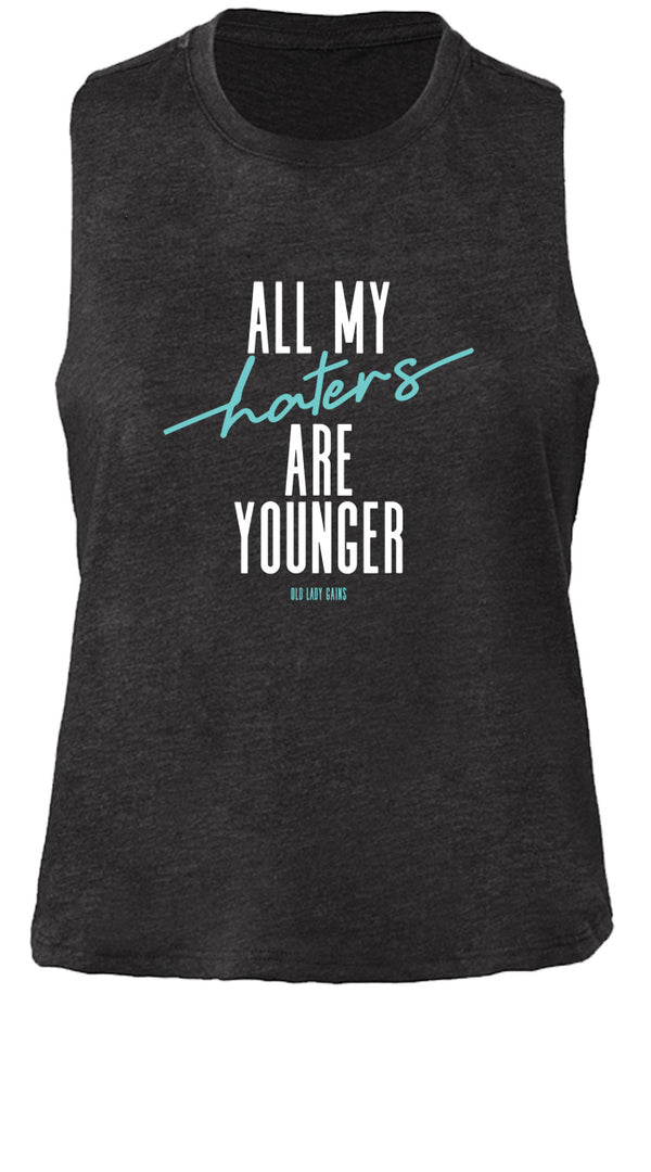 Tank top with bold "All My Haters Are Younger" graphic design for confident women.