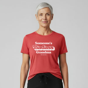 Strong woman over 50 wearing Someone’s Badass Grandma tee.