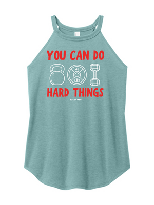A heathered teal halter tank top with a red and white graphic print on the front that reads 'YOU CAN DO HARD THINGS' with kettlebell, weight plate, and dumbbell illustrations.